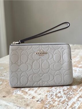 Coach Embossed Pebbled Leather Wristlet in Light Tan with Gold Logo